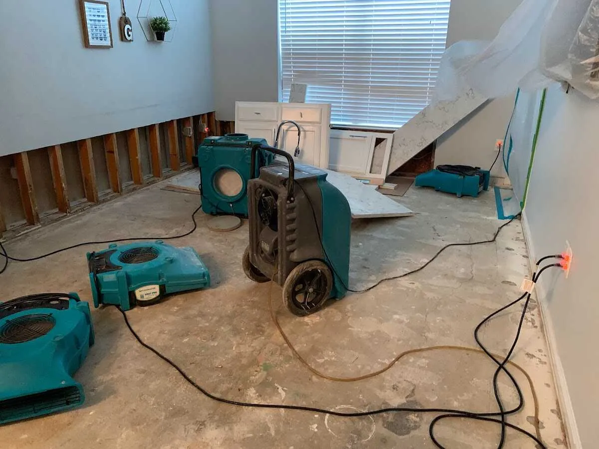 Dehumidifier in flood-cut room for Water Damage Restoration in Flowery Branch